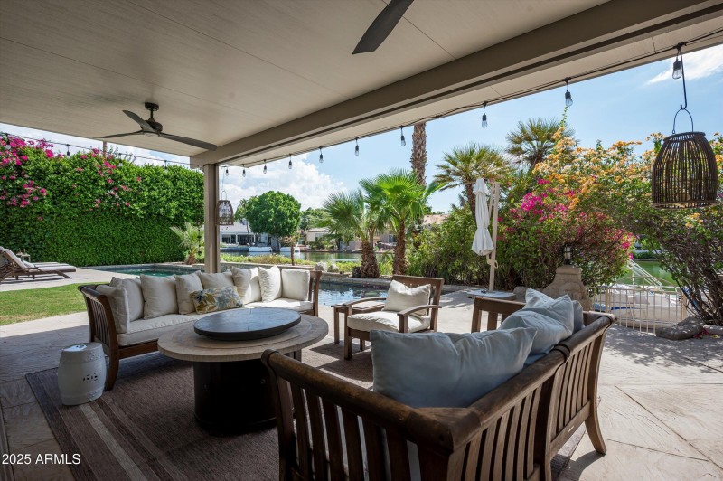Covered patio space with bistro lights