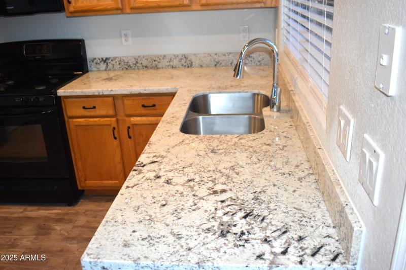New level 2 granite in kitchen