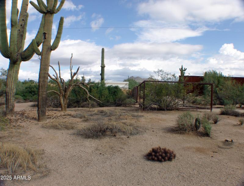 EAST SIDE NEIGHBOR FENCING AND LOT LINE