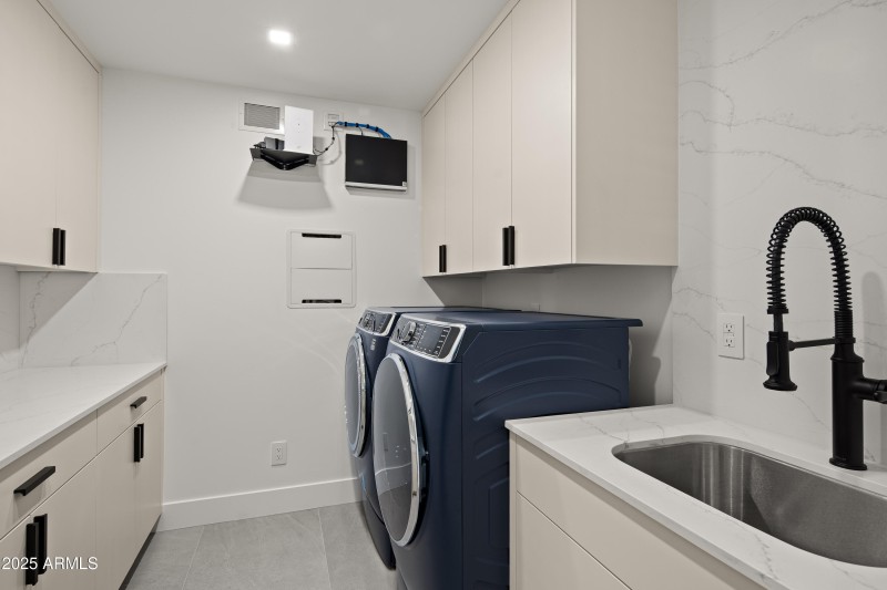 LAUNDRY ROOM WITH WASHER, DRYER, SINK
