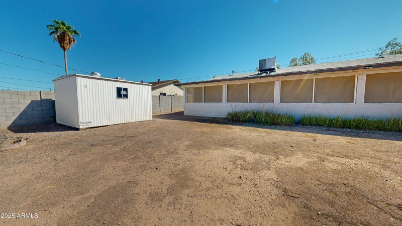 BACK OF HOME AND WORKSHOP