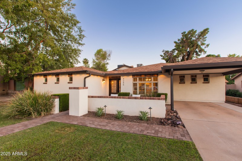Carport in Front + 2 Car Garage In Back