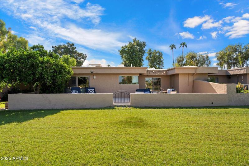 View of back patio from lake