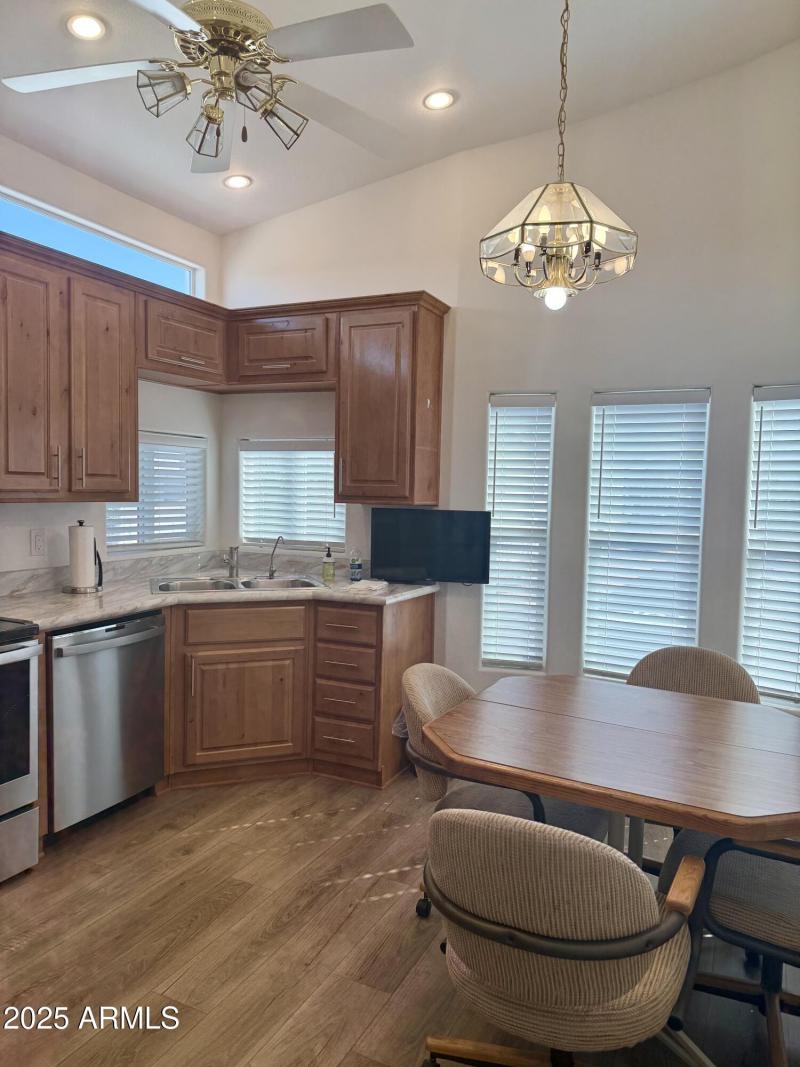 7750 E. Broadway Rd. #111