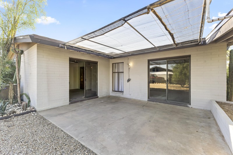PRIVATE PATIO OFF OF PRIMARY BEDROOM