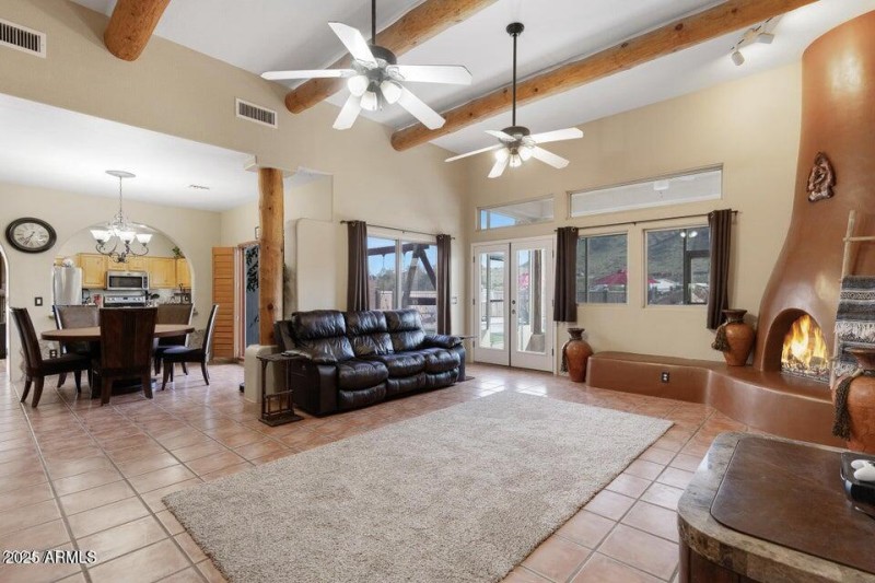 Living room with woodburning fireplace