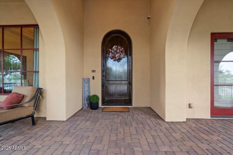 Inviting Wraparound Paver Front Porch