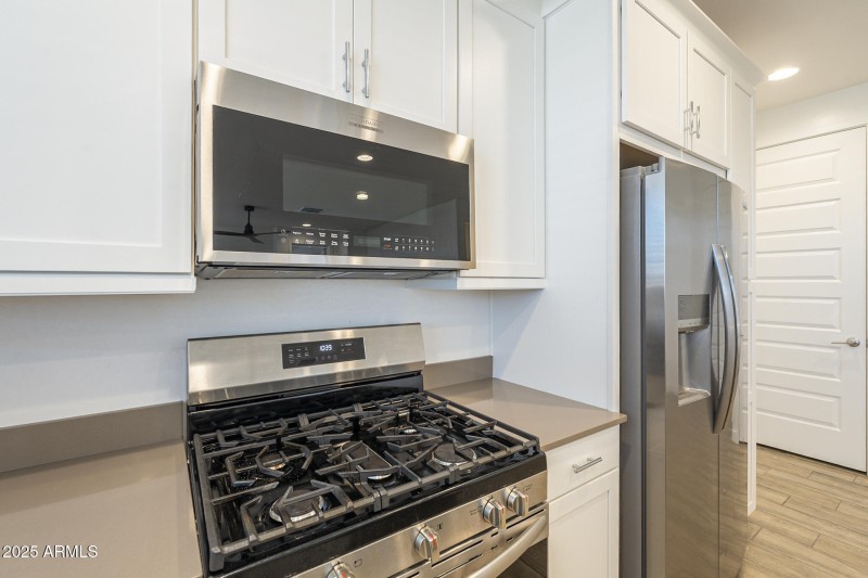 Refrigerator stays with the home.