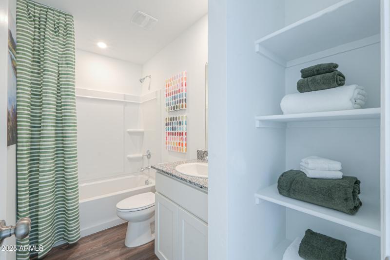 Aguila Upstairs Hall Bath