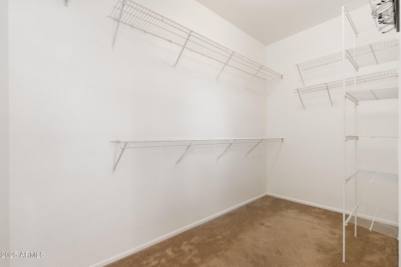 Primary walk-in-closet