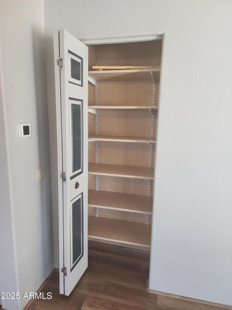 26. Living room Closet opened