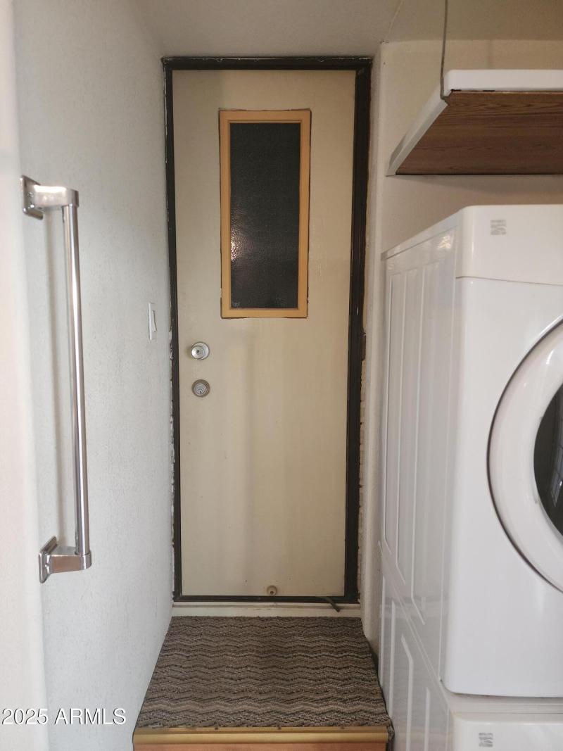 60. Door back in to quest bedroom.