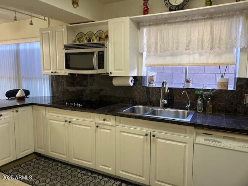 Kitchen overlooking dining area