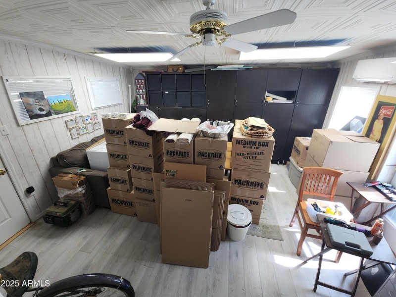 74. Step down into the finished AZ room.