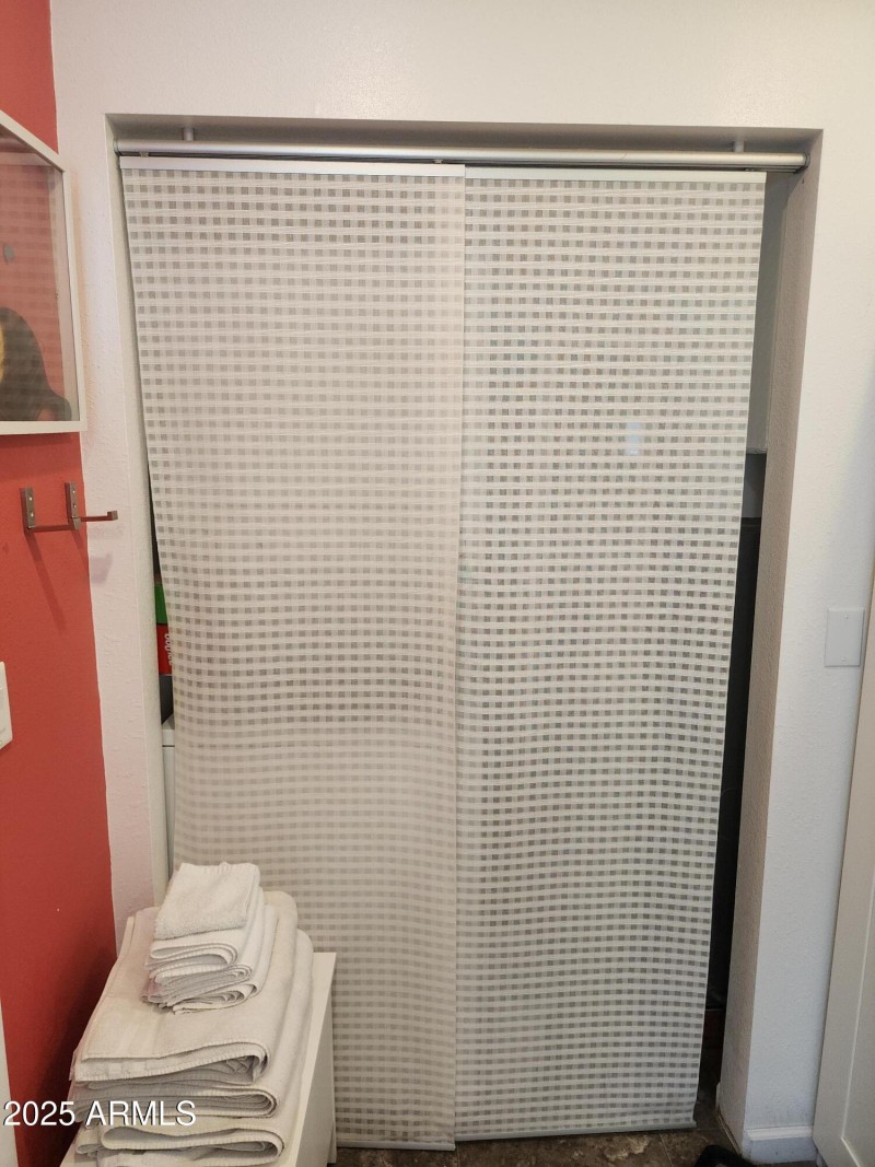 52. With Sliding panel to hide the washe