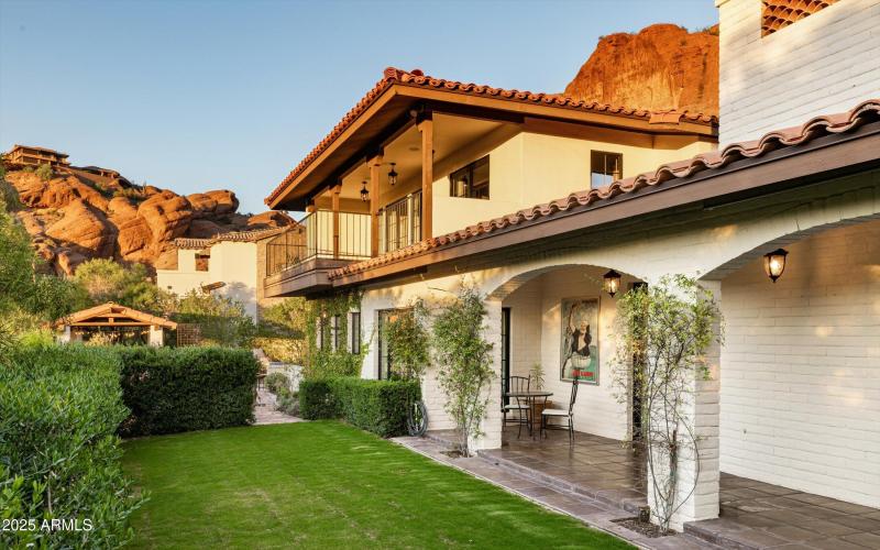 Lush Lawn with Shaded Patio