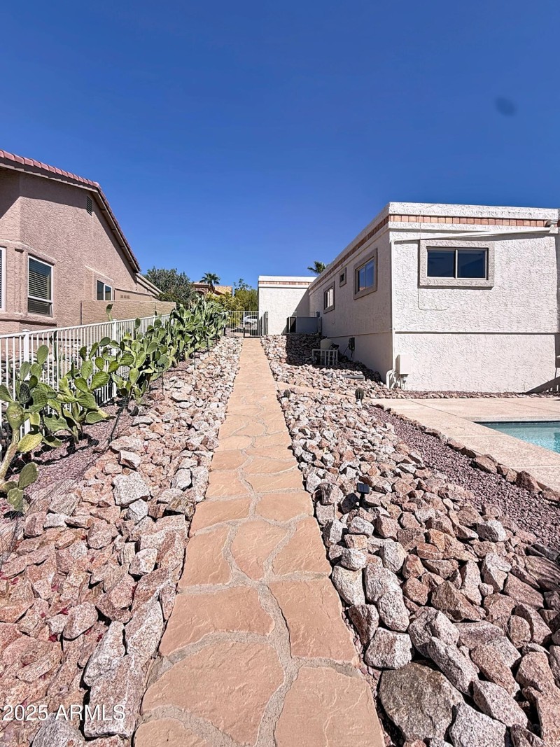 Side walk to Pool/Backyard