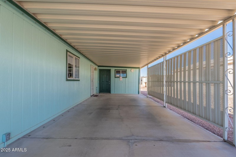 Carport looking towards workshop/shed