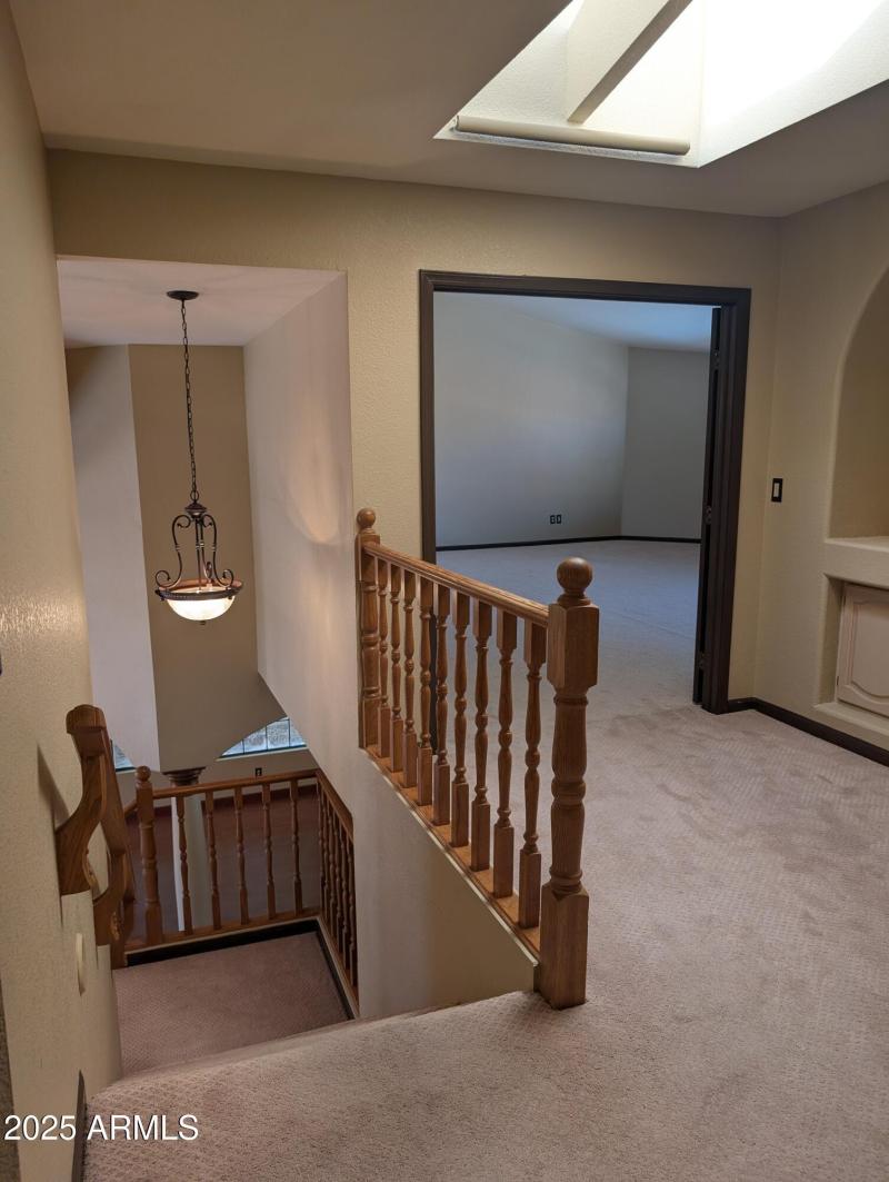 10 Entrance to primary bedroom at top of