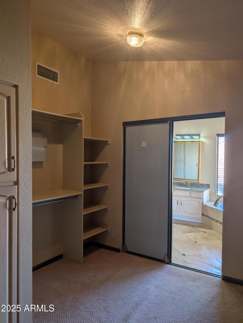 17 a Walk in closet with plenty of stora