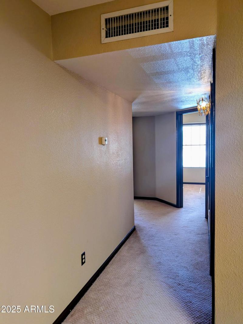 19 Hallway towards additional bedrooms