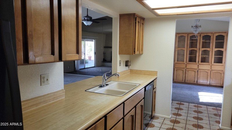 Kitchen overlooking into Livingroom