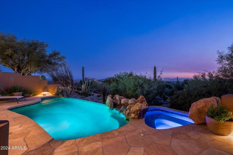 Evening Pool and City Lights