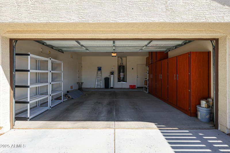 Garage w/ Built In Cabinets