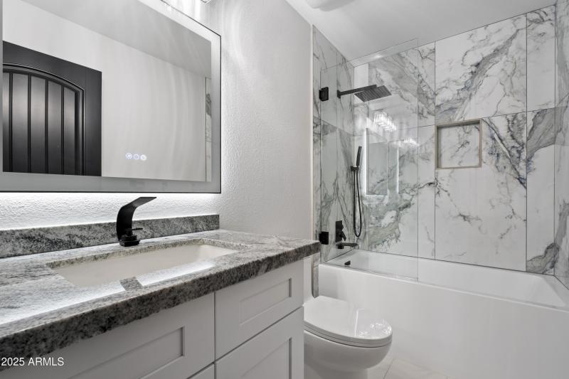 Elegant Guest Bath Matches Primary!!