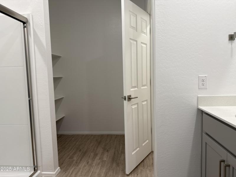 Primary bath linen shelves