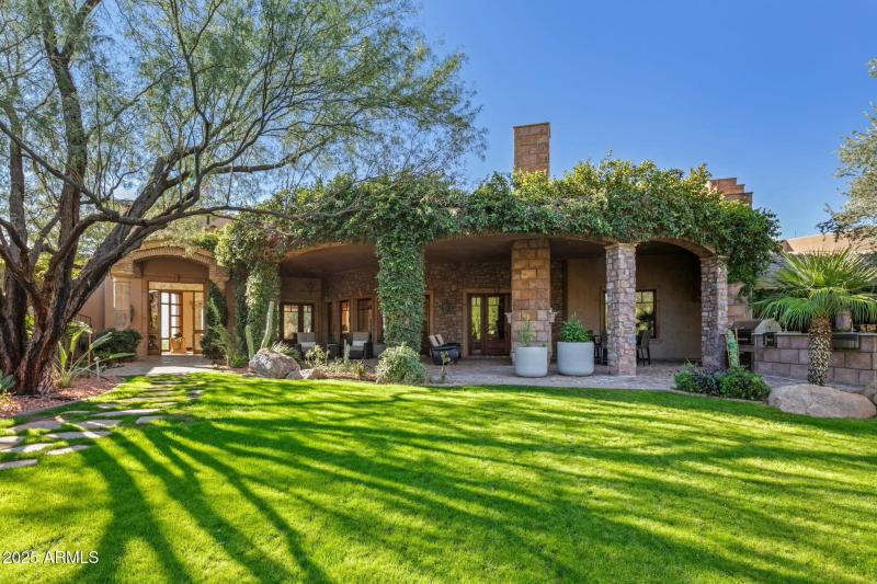 Lush Landscaping & Covered Patio