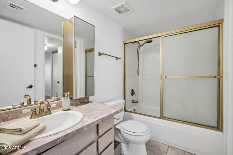 Bathroom with Gold Finishes