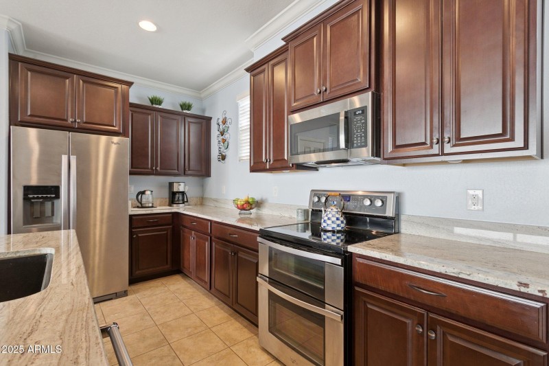 Granite counters, espresso cabinets