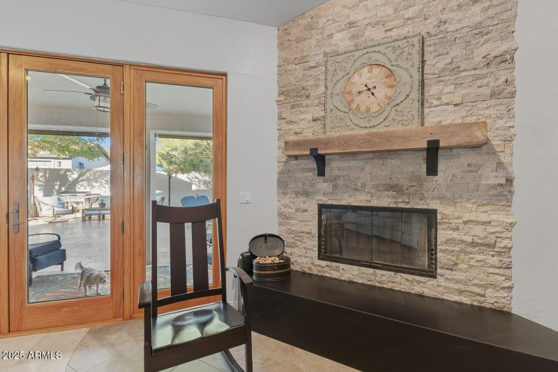 Stacked stone wood burning fireplace