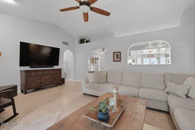 Great room towards foyer and kitchen