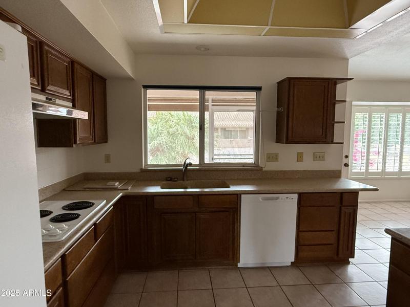 Kitchen Window to exterior back yard vie