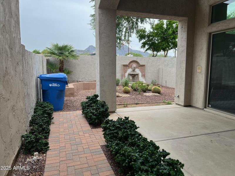 Covered patio and backyard