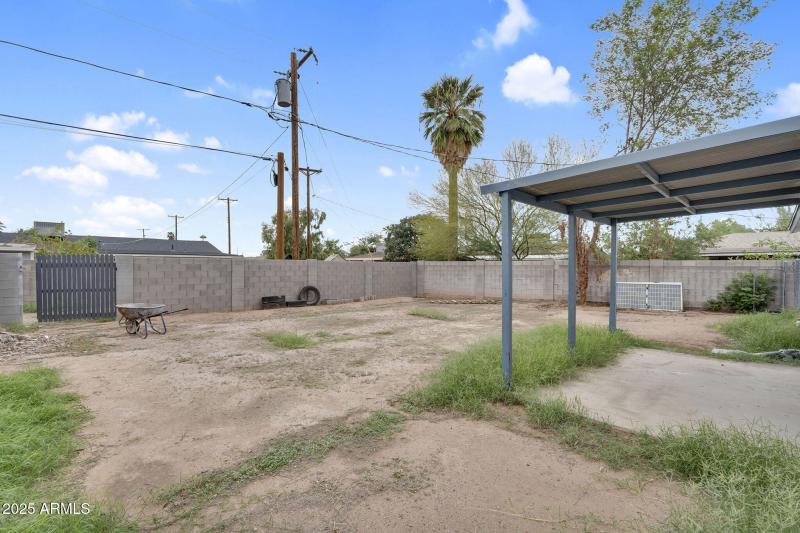 Backyard with gate to alley