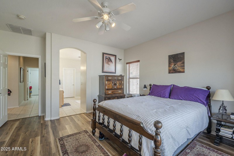 Primary bedroom view to the primary bath