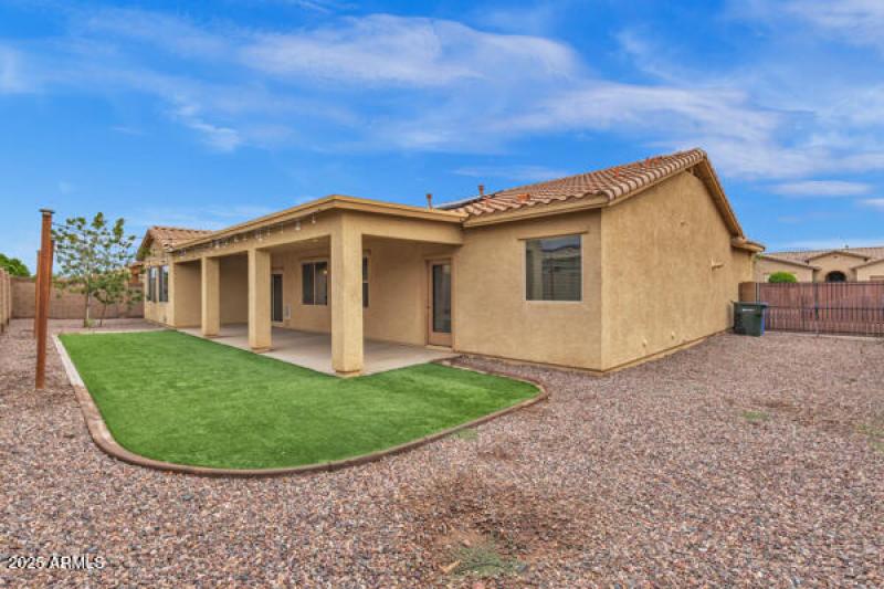 5704 S. 57TH DR SOLD MEDIA BACKYARD 3