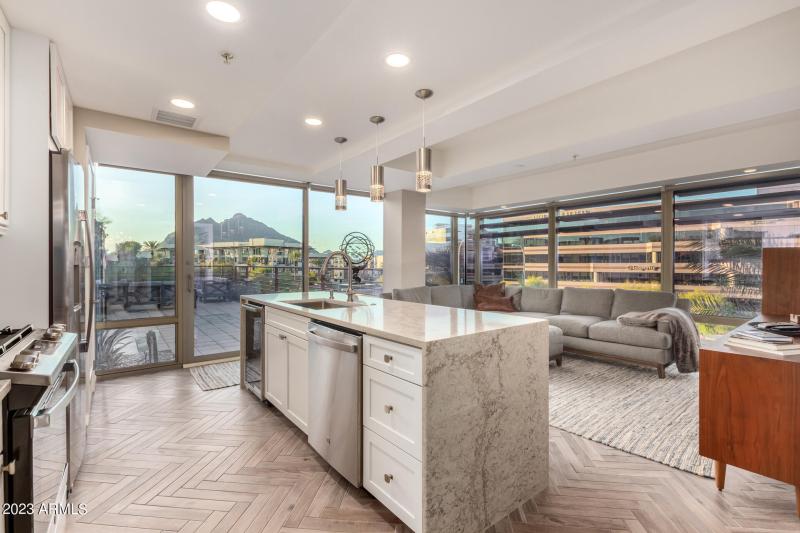 Herringbone tile floor throughout