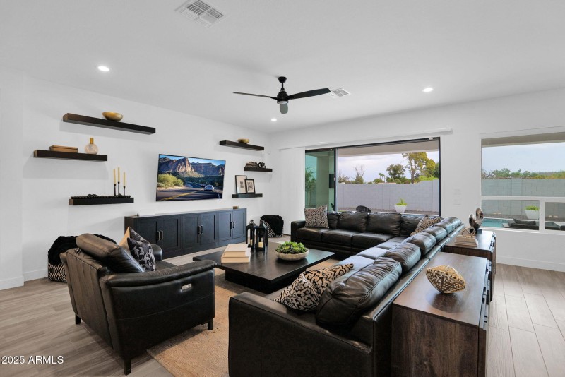 Great room w/sliding doors to pool area