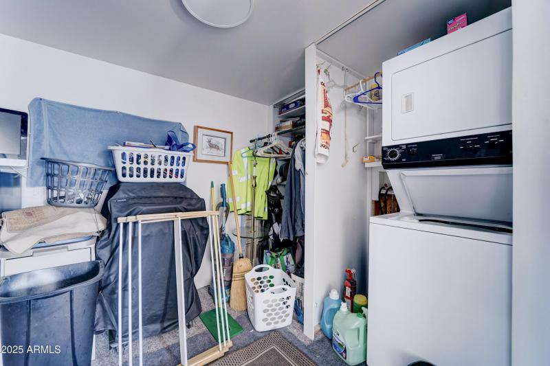 Stacking laundry in shed