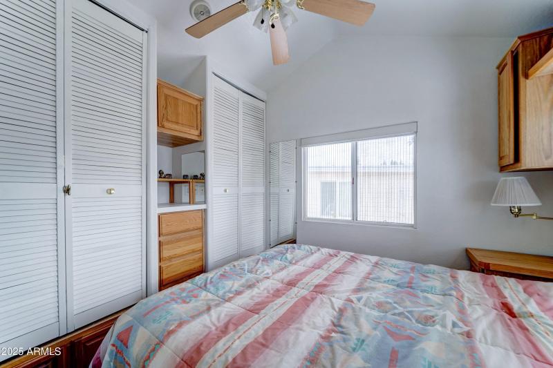 Two closets and dresser drawers in bedro