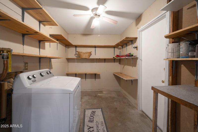 Laundry room with Lots of shelfs