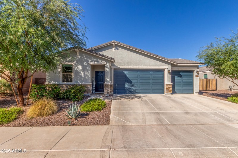 Front of home 3 car garage