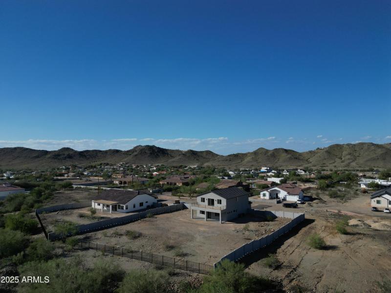 Back property with block wall and fencin