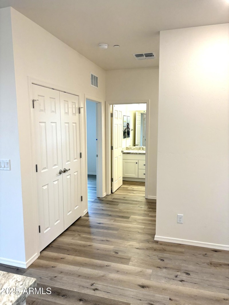 Hallway with laundry closet