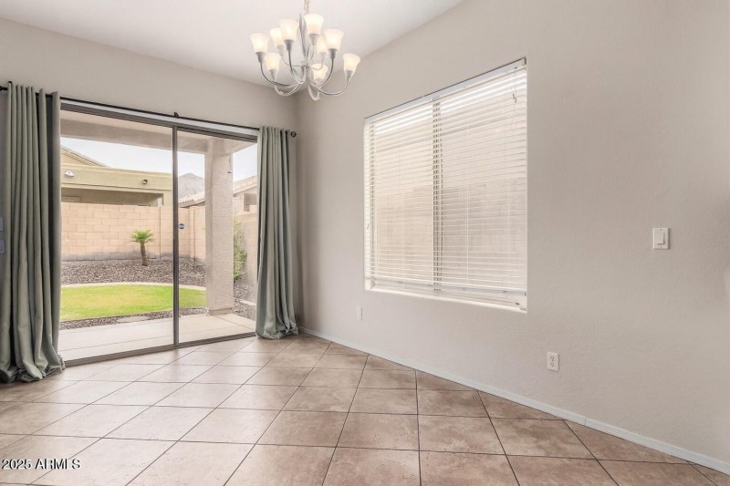 Modern Dining Room with Backyard View