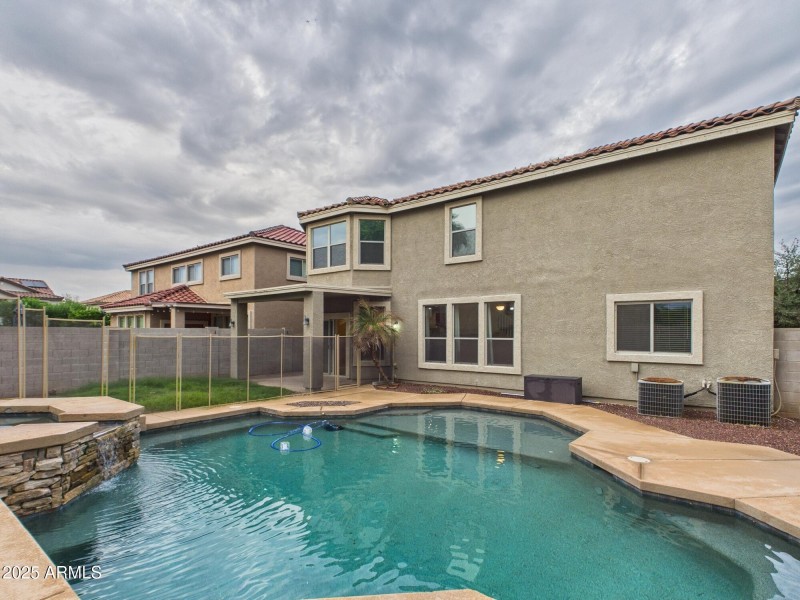 Raised spa with spillover